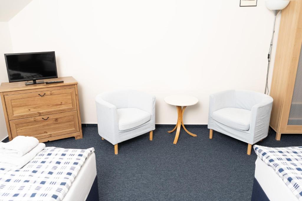 Postel nebo postele na pokoji v ubytování Penzion Grado Davle