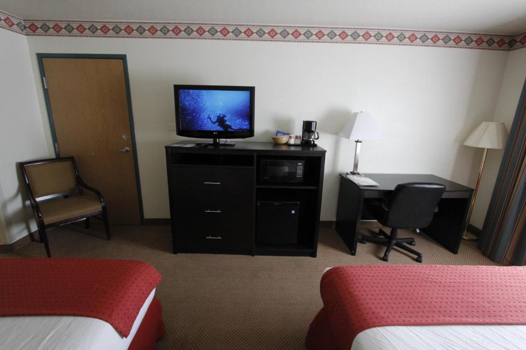 Postel nebo postele na pokoji v ubytování Ramada by Wyndham Williams/Grand Canyon Area