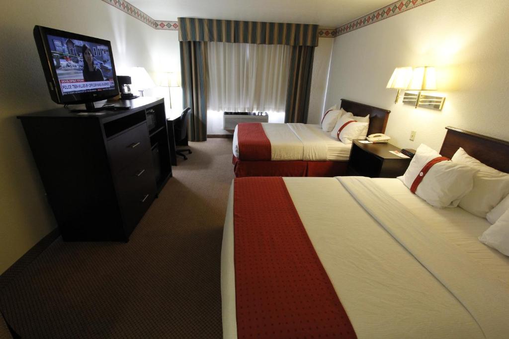 Postel nebo postele na pokoji v ubytování Ramada by Wyndham Williams/Grand Canyon Area