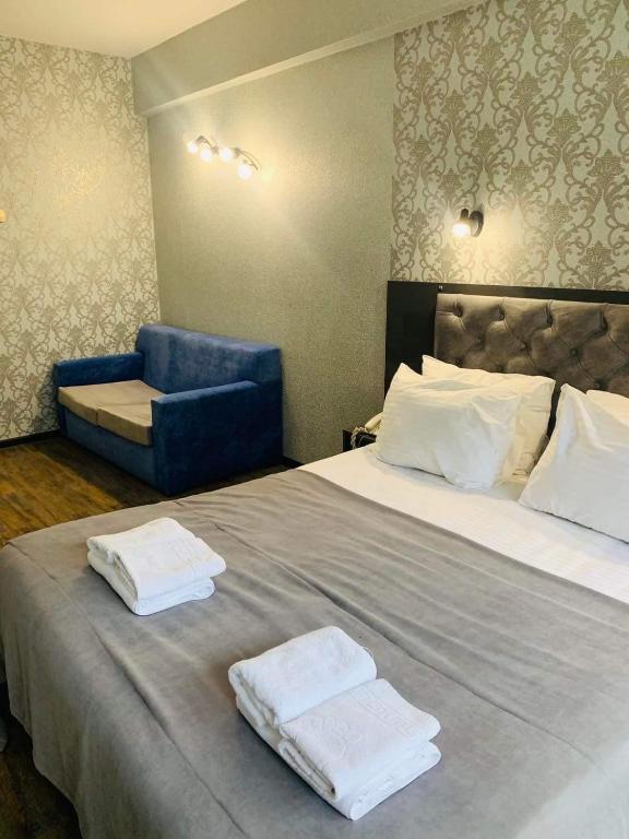 Postel nebo postele na pokoji v ubytování Villa ReTa Hotel & SPA