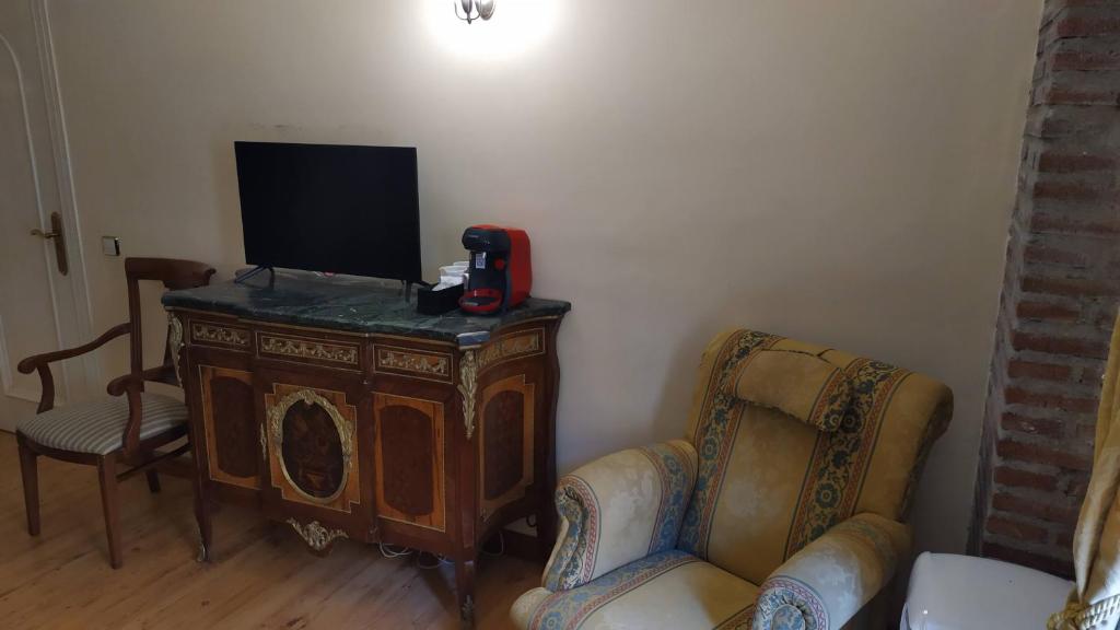 TV a/nebo společenská místnost v ubytování Hotel Rural Cayetana