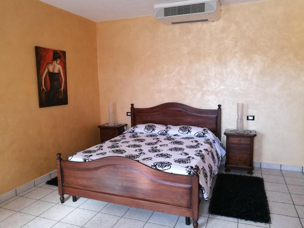 Postel nebo postele na pokoji v ubytování AGRITURISMO I CAMINI
