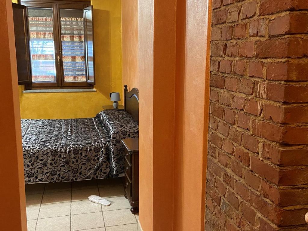 Postel nebo postele na pokoji v ubytování AGRITURISMO I CAMINI
