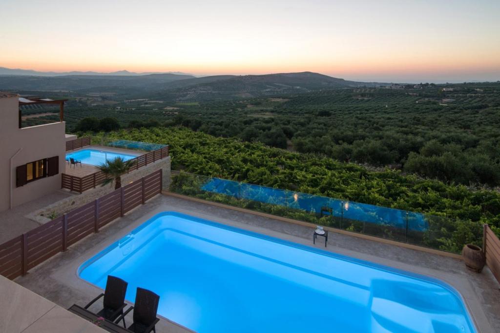 The swimming pool at or close to Stylish Villa Liatiko - Heated pool - Amazing views