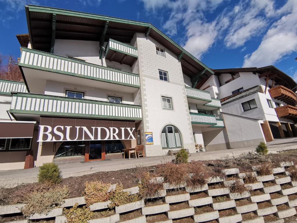 a building with a sign that reads bunnirk at Zirbennest in Serfaus