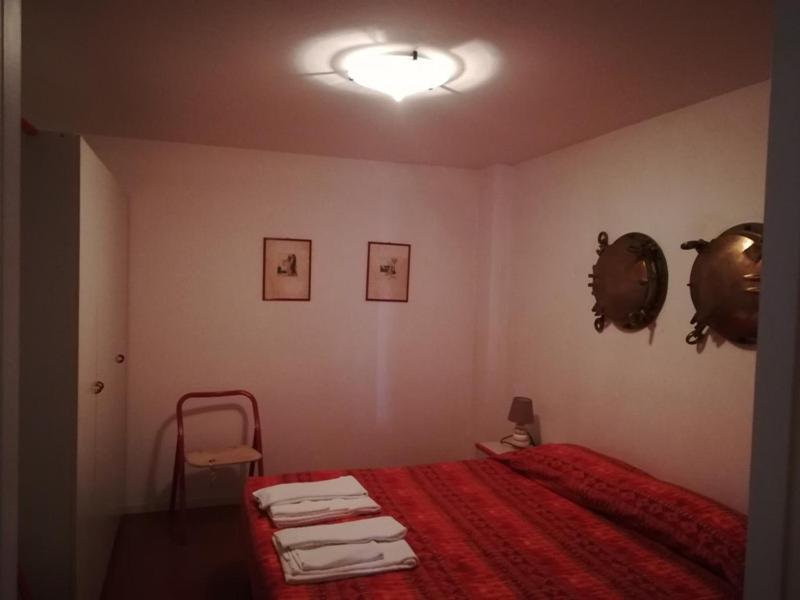 Łóżko lub łóżka w pokoju w obiekcie Portofino Est Residence