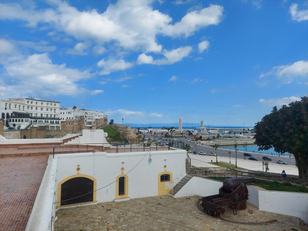 a view of the city from the roof of a building at Blue Horizon-Ghougine in Tangier