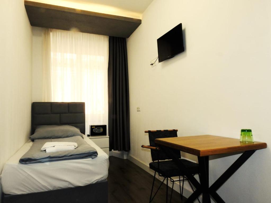 Postel nebo postele na pokoji v ubytování Hotel Hecht