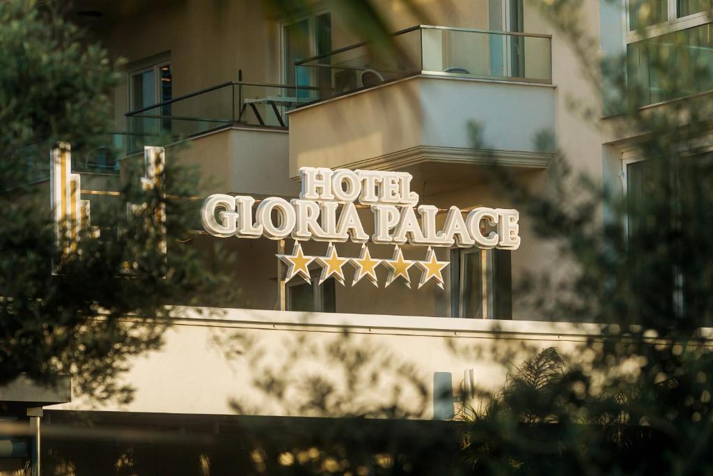 a hotel clonda palace sign on the side of a building at Gloria Palace Hotel & SPA in Golem