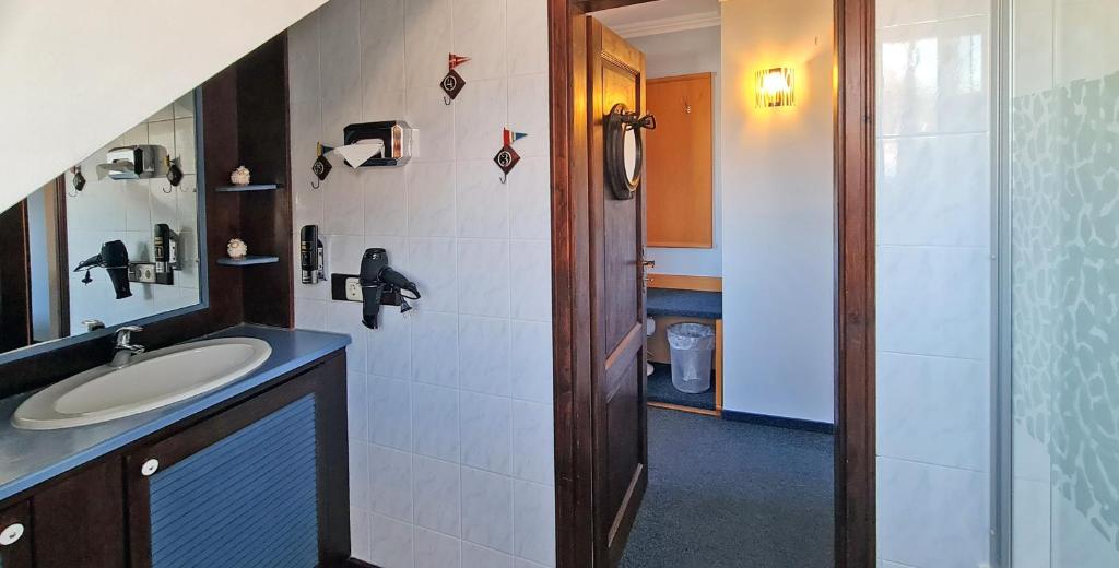 Koupelna v ubytování Donau-Hotel