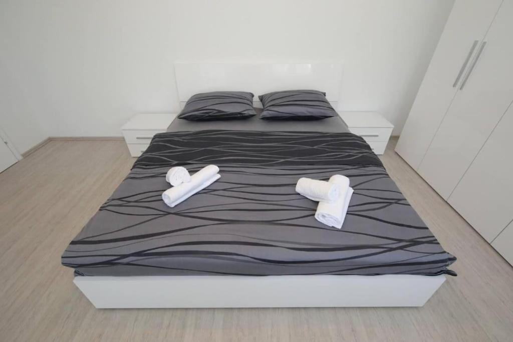 Postel nebo postele na pokoji v ubytování Modern House Giulia
