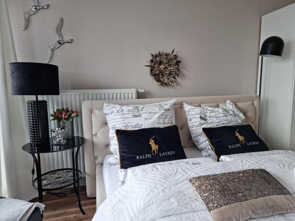 Postel nebo postele na pokoji v ubytování Apartament Prestige & Sea Horyzont 613