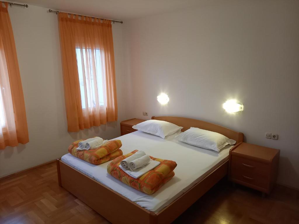 Postel nebo postele na pokoji v ubytování Villa Fontana
