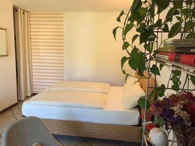 Postel nebo postele na pokoji v ubytování B&B Romy Rocker