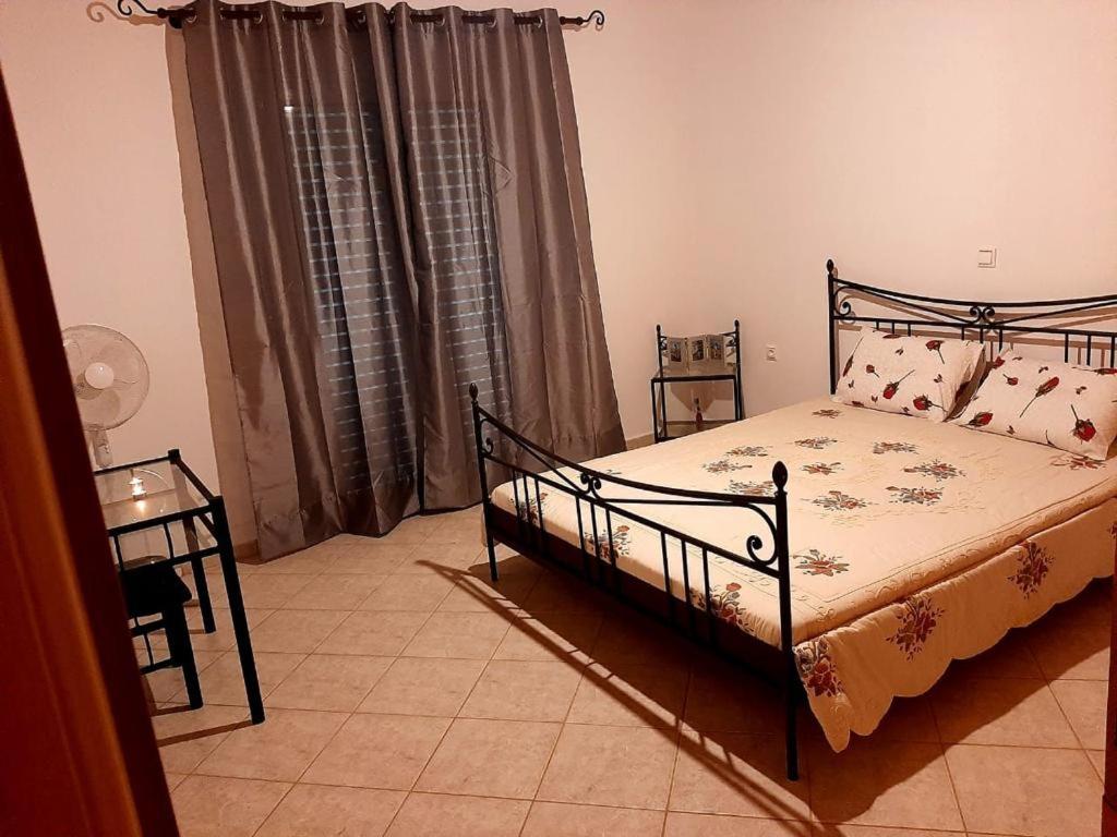 Posteľ alebo postele v izbe v ubytovaní Vasiliki's House Zacharo , 27054 , Ilias