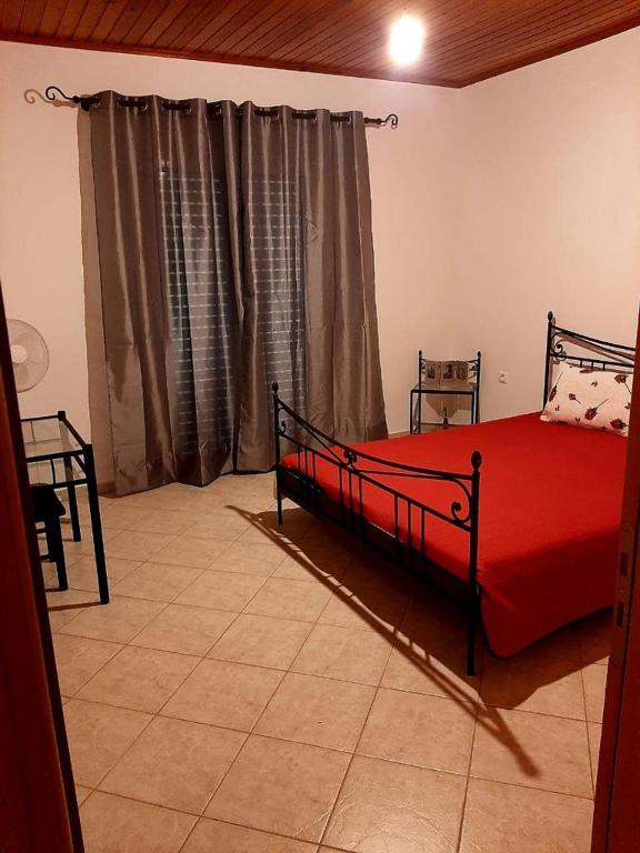 Posteľ alebo postele v izbe v ubytovaní Vasiliki's House Zacharo , 27054 , Ilias