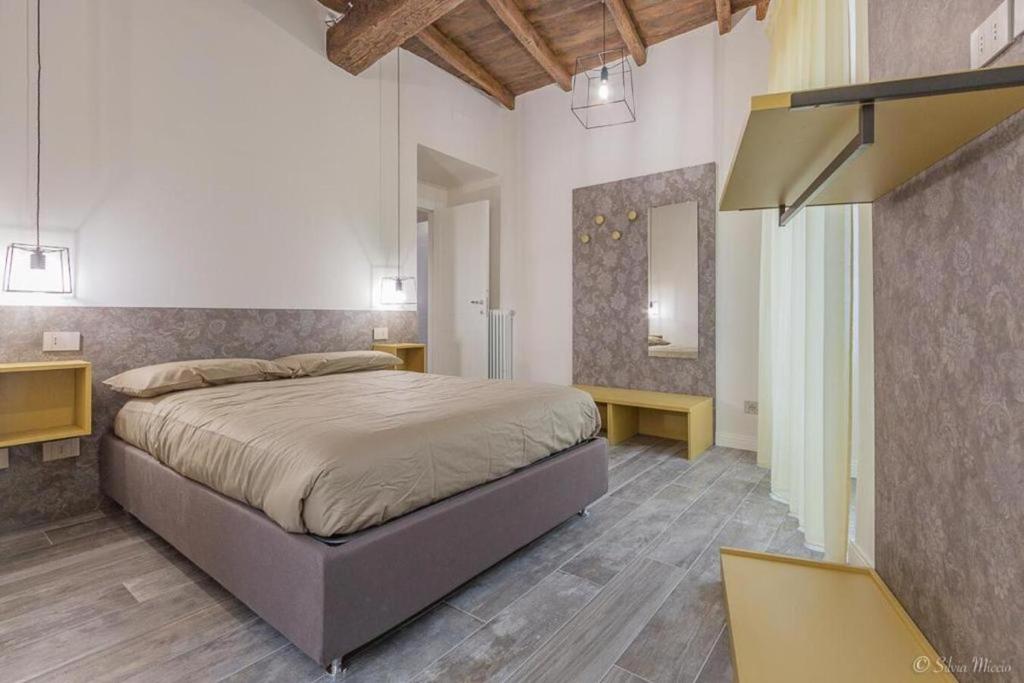 A bed or beds in a room at SDL luxury home Al Pavone