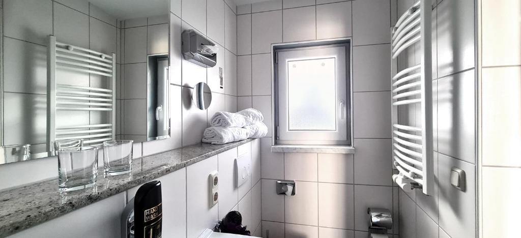 Koupelna v ubytování Donau-Hotel