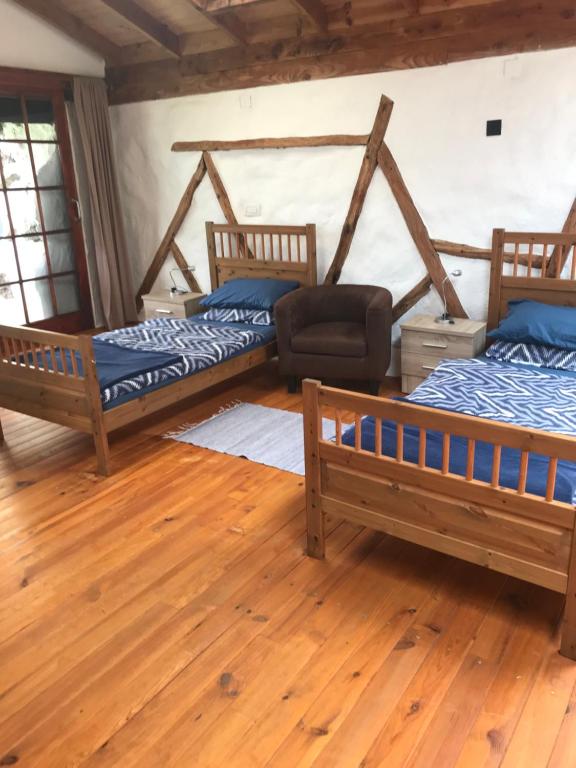 Cama o camas de una habitación en Finca Casa Madera 1