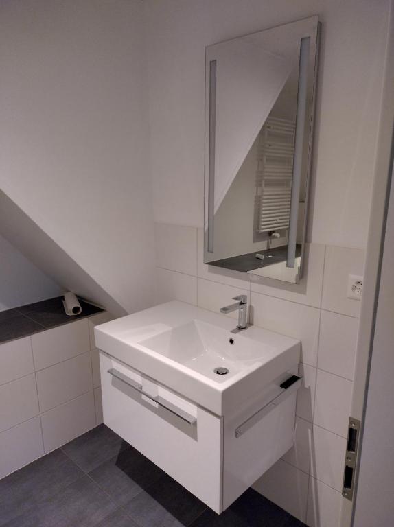 Koupelna v ubytování 2 1/2 Zimmer Ferienwohnung