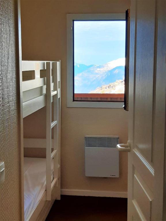 Posteľ alebo postele v izbe v ubytovaní Valmeinier 1800 - Le Caribou - 3P - 41m2 - 6/7p - Pied des pistes