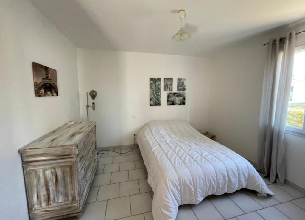 Postel nebo postele na pokoji v ubytování Villa et maisonnette provençales