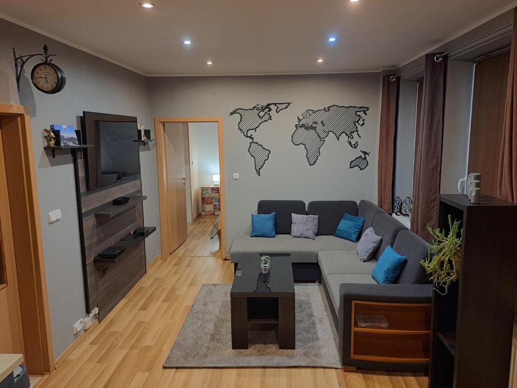 A seating area at Apartman Alma