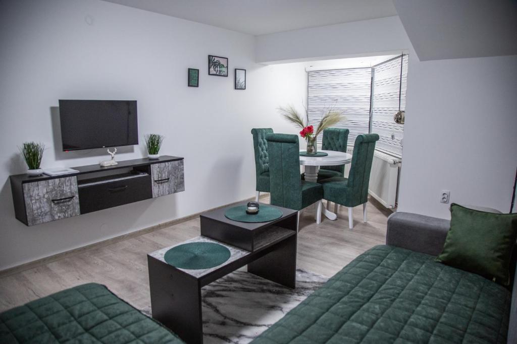 TV a/nebo společenská místnost v ubytování Happy