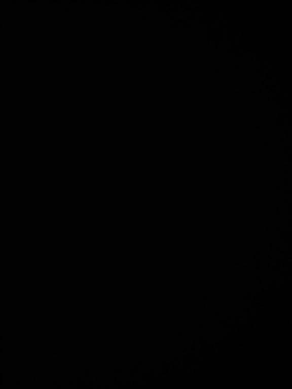 a dark room with a black background at Dom Klaudiusz in Warpuny