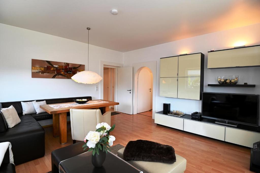 TV a/nebo společenská místnost v ubytování Berghaus Tirol - Luxus Apartement