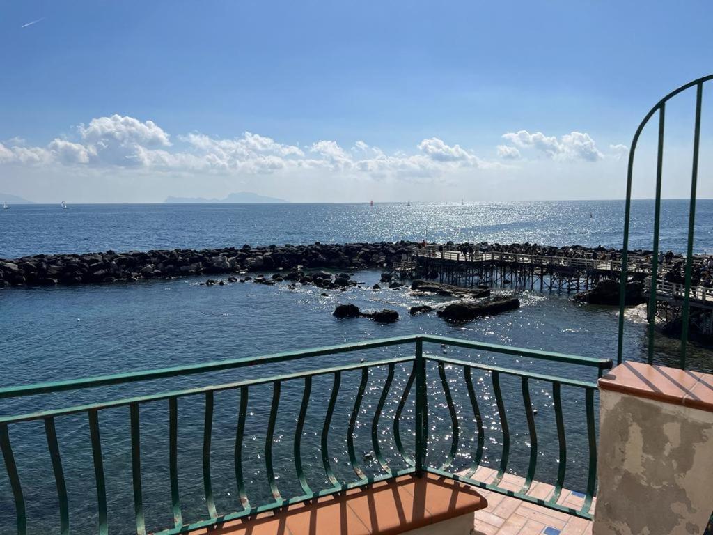 a view of the ocean from a balcony at Marechiaro House in Naples