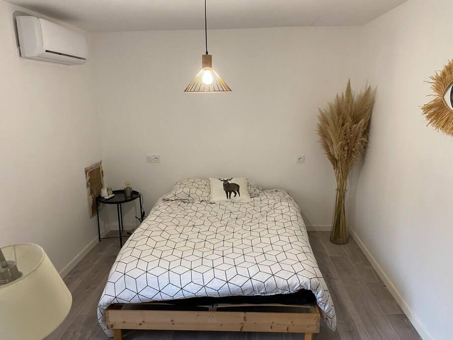 Posteľ alebo postele v izbe v ubytovaní Maison à l’île de la Barthelasse