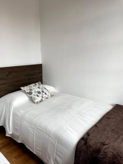 Postel nebo postele na pokoji v ubytování La Llamera