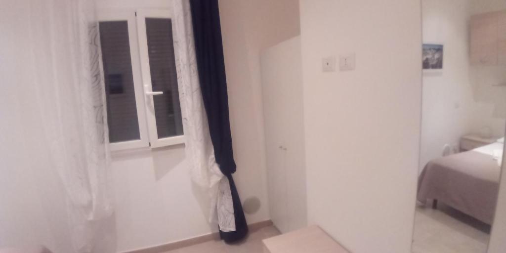 Postel nebo postele na pokoji v ubytování InBlu