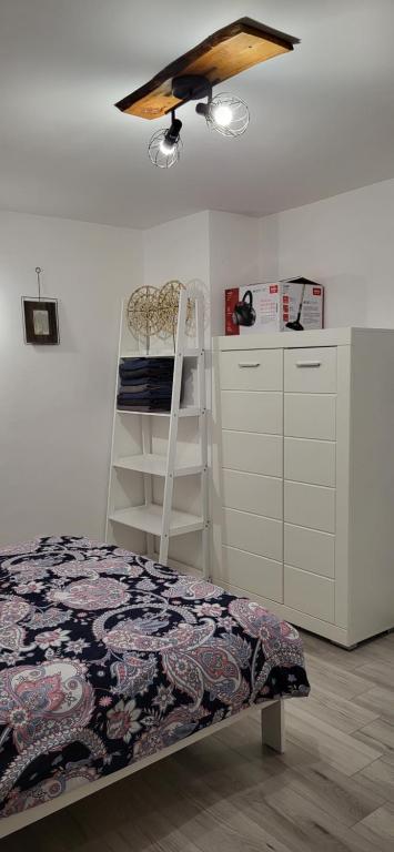 Posteľ alebo postele v izbe v ubytovaní Apartament DWA DĘBY