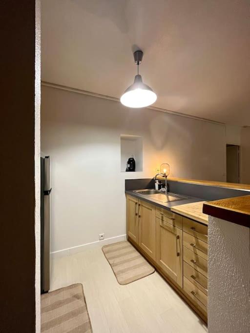 Kuchyňa alebo kuchynka v ubytovaní Appartement - Centre ville historique - Avec vue