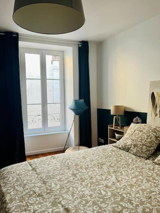 Posteľ alebo postele v izbe v ubytovaní Appartement - Centre ville historique - Avec vue
