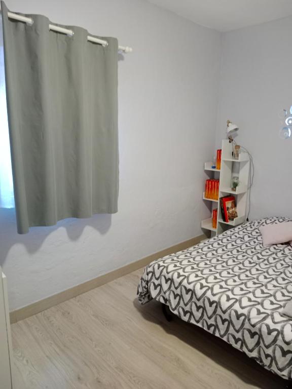 Postel nebo postele na pokoji v ubytování Can Pitu Ferrer