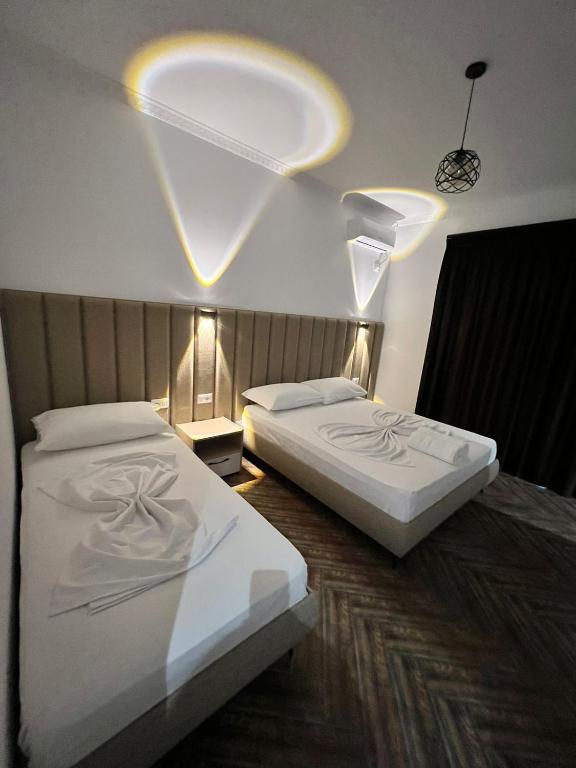 Postel nebo postele na pokoji v ubytování Villa AX Mirage