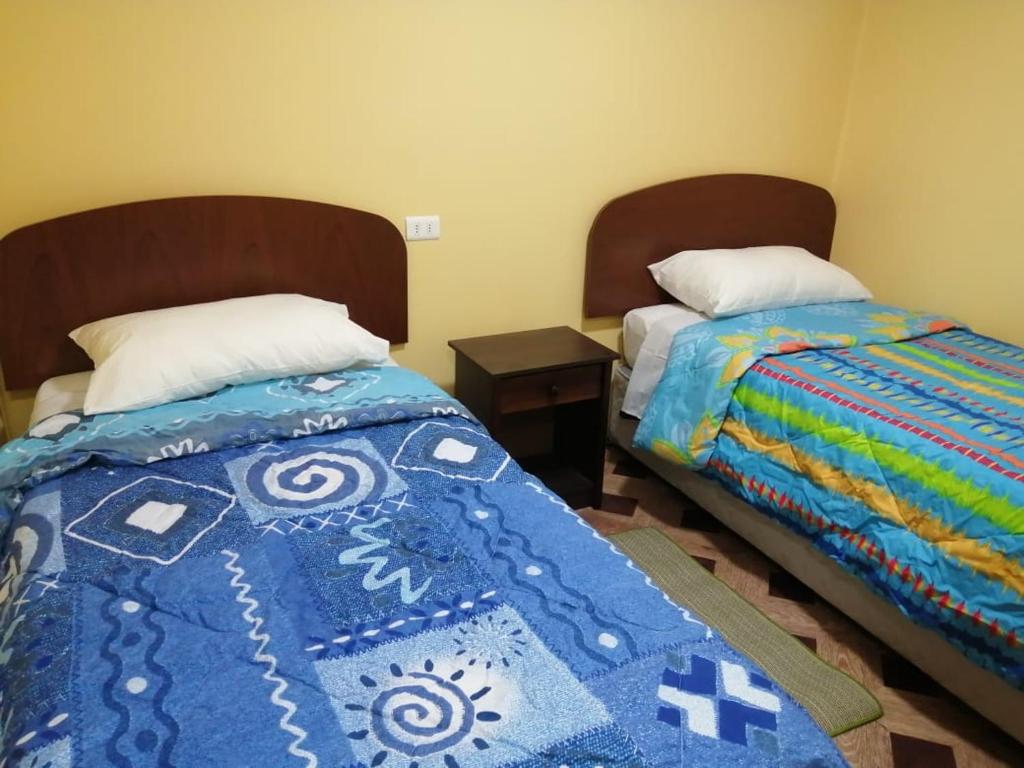 Postel nebo postele na pokoji v ubytování TyP Departamentos