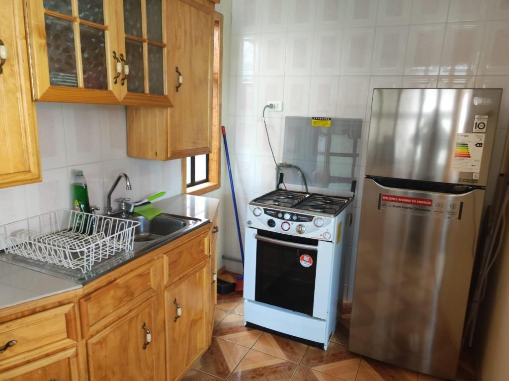 Kuchyň nebo kuchyňský kout v ubytování TyP Departamentos