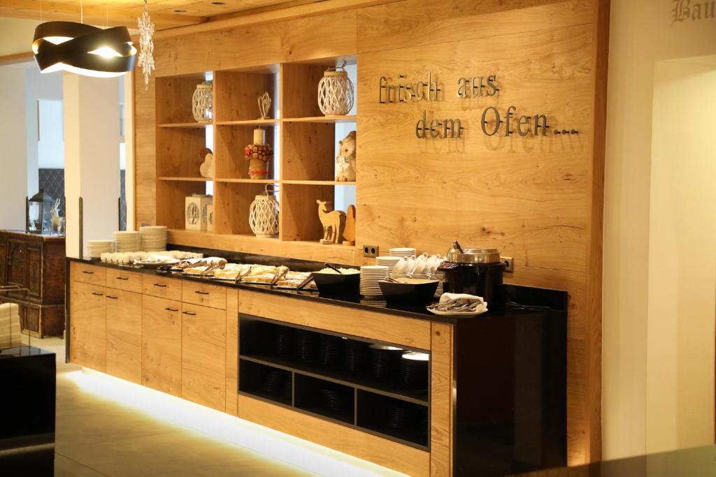 Kuchyň nebo kuchyňský kout v ubytování Hotel Alphof Alpbach