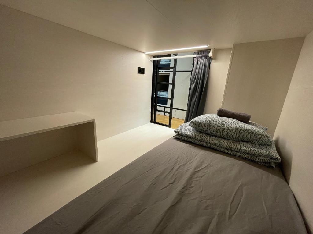 Postel nebo postele na pokoji v ubytování Sleep&Go Hostel Ljubljana