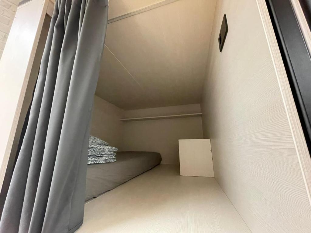 Postel nebo postele na pokoji v ubytování Sleep&Go Hostel Ljubljana