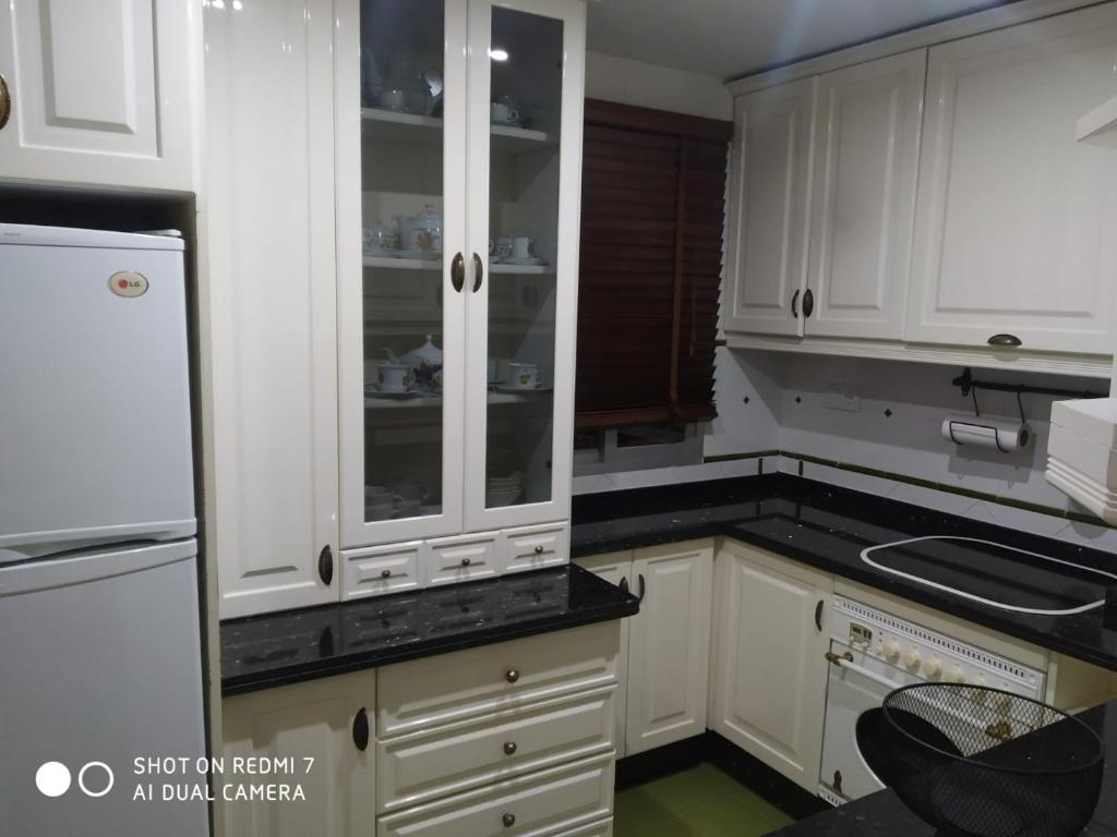 Kuchyň nebo kuchyňský kout v ubytování Apartamento Cartago