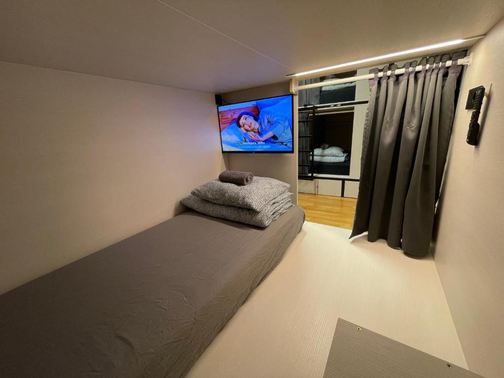 Postel nebo postele na pokoji v ubytování Sleep&Go Hostel Ljubljana
