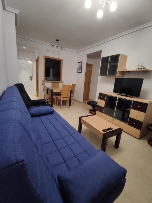 Posezení v ubytování Apartamento acogedor en Magic World, Torre la Sal