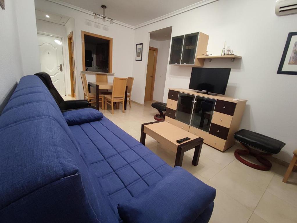 TV a/nebo společenská místnost v ubytování Apartamento acogedor en Magic World, Torre la Sal
