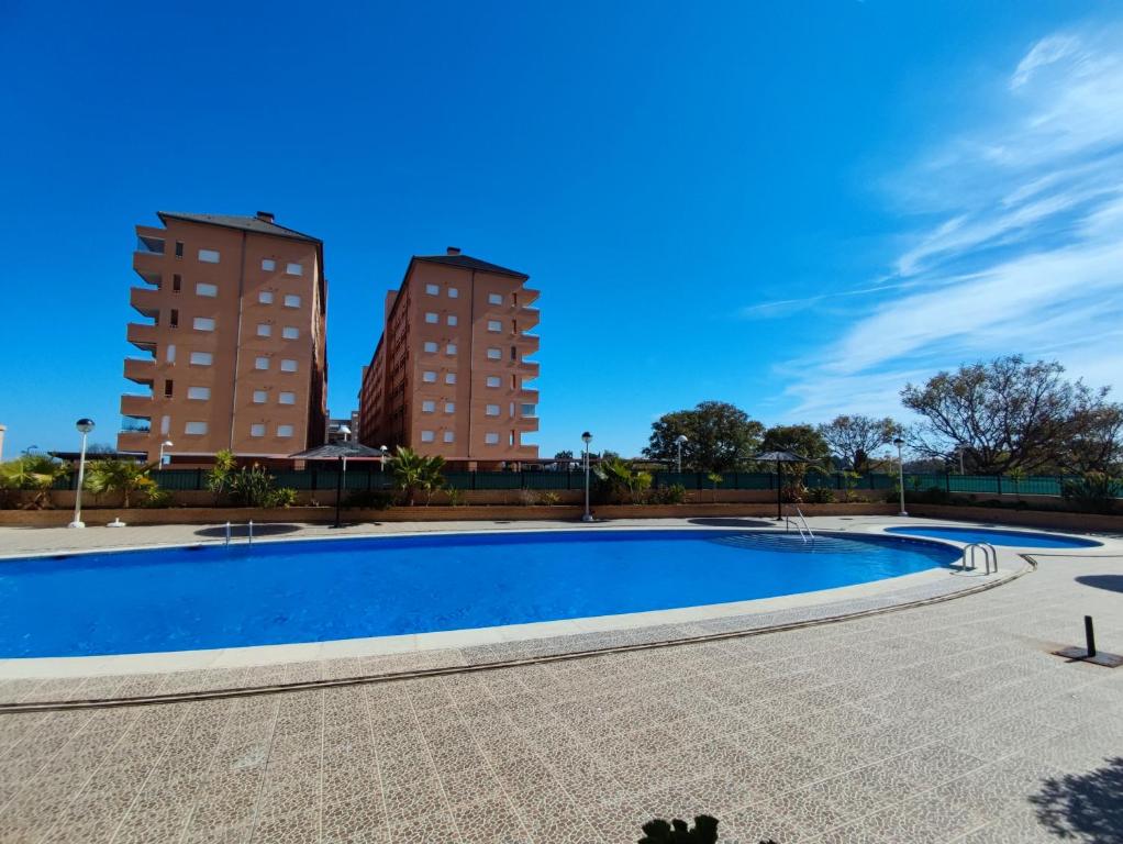 Bazén v ubytování Apartamento acogedor en Magic World, Torre la Sal nebo v jeho okolí