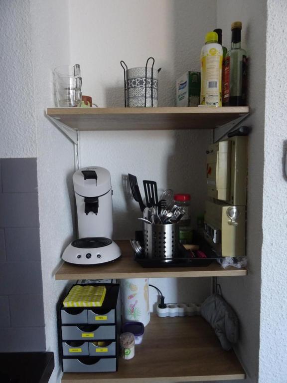 Kuchyňa alebo kuchynka v ubytovaní MARSEILLAN-PLAGE Appartement Coeur de sable